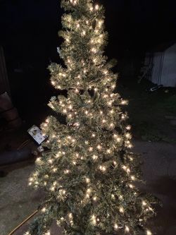 Holiday Time 6.5 Ft Pre-Lit Madison Pine Tree with clear lights. 