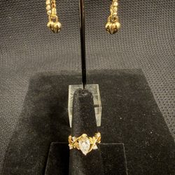 # 21. Elegant Moissanite Ring and Earrings Set