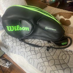 Wilson Brand New Tennis Bag Holds Several Rackets Has Several Zip Pockets