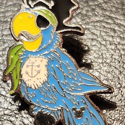 Shanghai Disney Resort Hidden Mickey Pirates of the Carribean Blue Parrot Green Scarf Disney Trading Pin released 2008. In mint condition