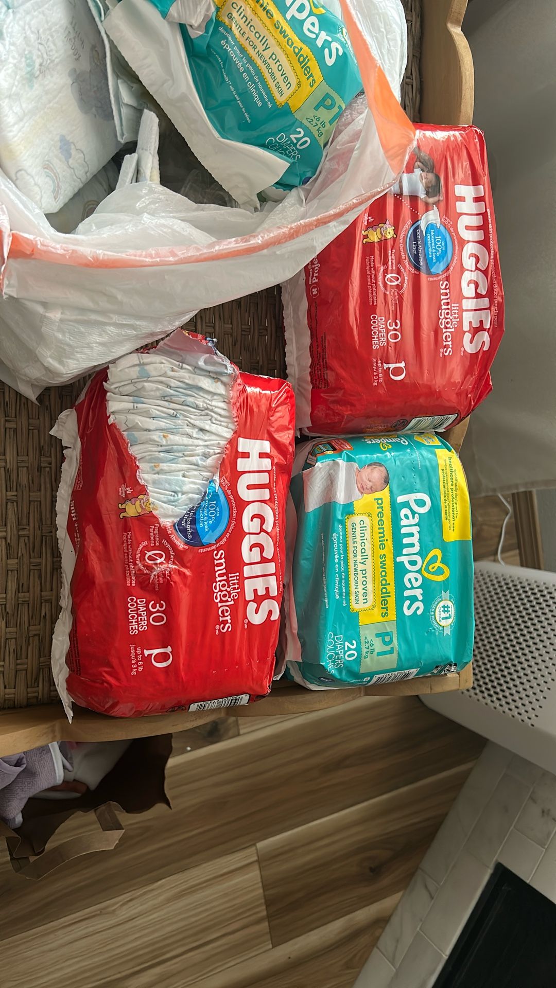 Over 80 Preemie Diapers!! 