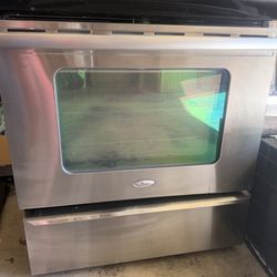 Whirlpool appliance set and ceiling fan