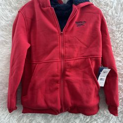 Kid’s Reebok Red Hoodie Jacket In Size XL (18/20)