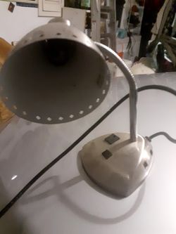 Stainless steel desk lamp w oulet- very versatile