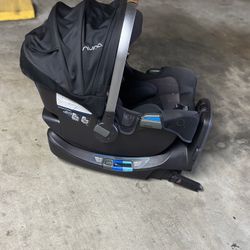 Nuna infant car seat and base