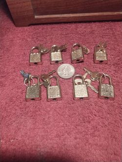 Eight small padlocks