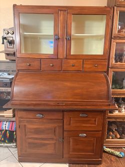 Hoosier style antique kitchen baking cabinet with display shelves and storage