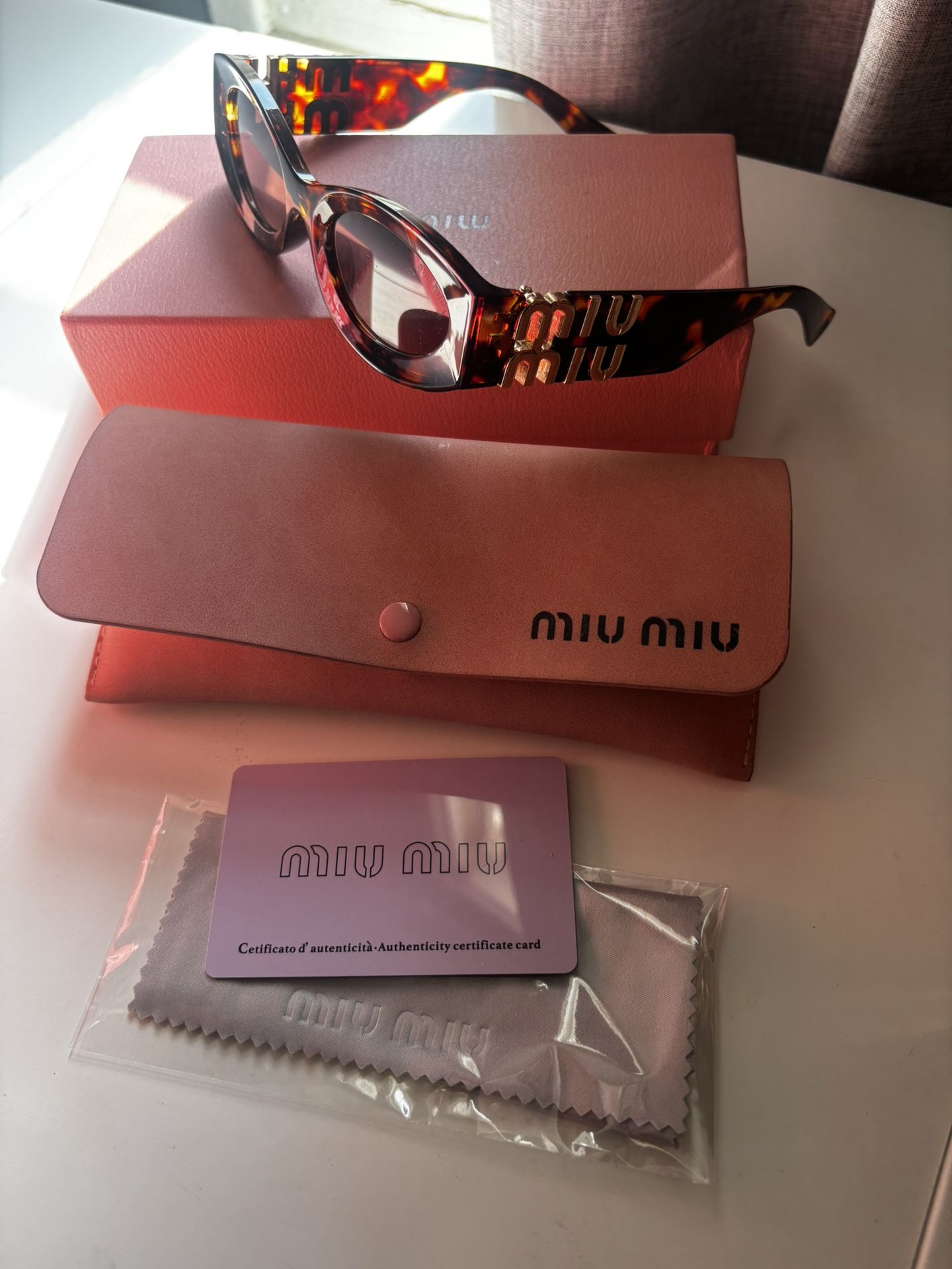 MIU MIU SUNGLASSES
