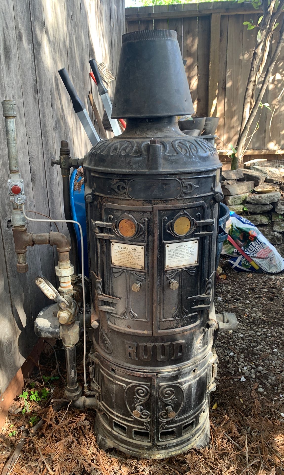 Antique water heater. RUUD On Demand