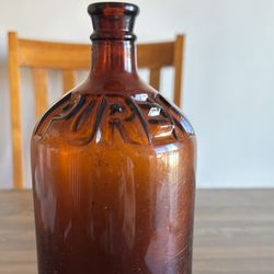 Vintage brown glass Purex bleach bottle  Early 1900’s Anchor Hocking  32 oz size  9”