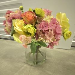 Faux Flowers In A Clear Vase