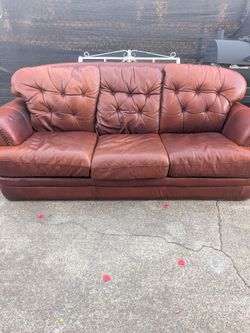 Matching Brown Leather sofa and oversized chair