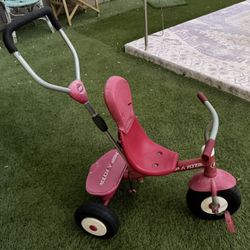 Red Radio Flyer 4-in-1 Stroll ‘N Trike Tricycle with Storage and Push Handle