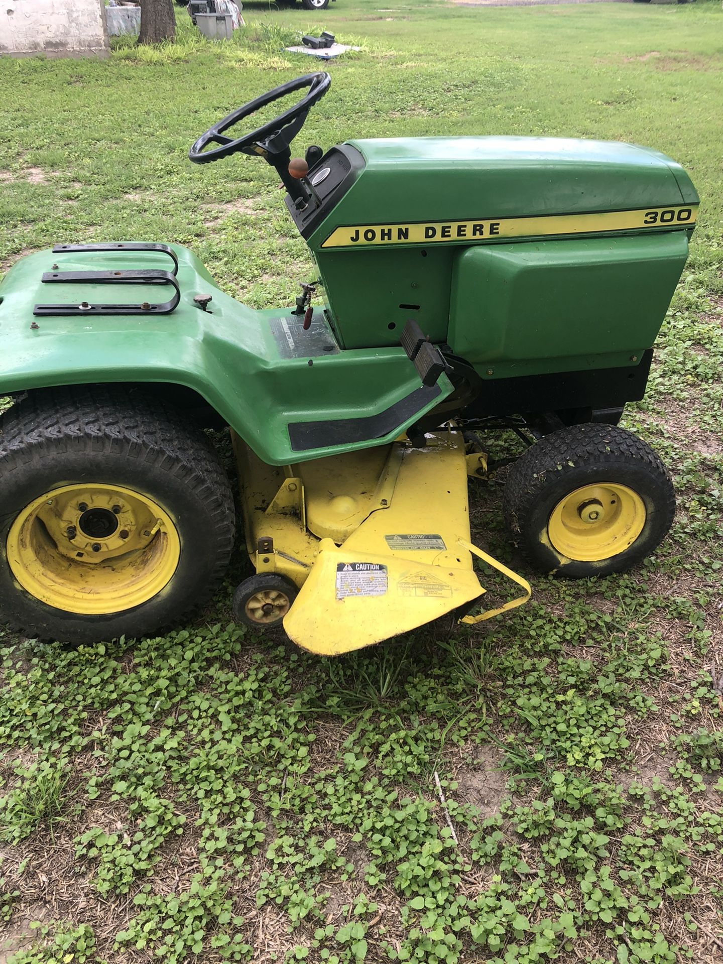 John deere 300 lawn tractor for sale clearance