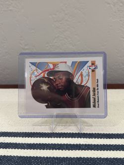 Michael Jordan 1991 SkyBox #334 – “Michael Brings Home the Trophy” 🏀🔥