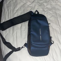 Blue men’s cross body bag