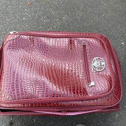 Kathy van Leeland carry on rolling suitcase