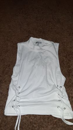Sleeveless white shirt