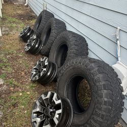 Toyota TRD Off-Road OEM wheels and 35" Falken Wildpeak M/T tires (set of 4)