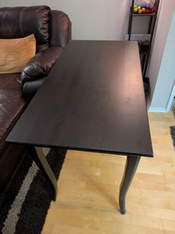 Stylish and sturdy black wood desk