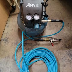 2 Gallon 100 Psi  Air  Compressor With Holes Like New 