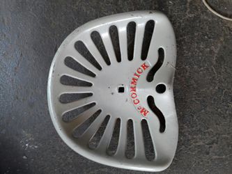 Vintage mc cormick cast iron tractor seat has repainted great cond very cool peace