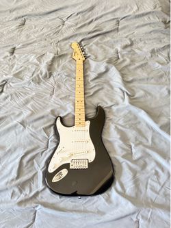 LEFT HANDED SQUIER ELECTRIC GUITAR