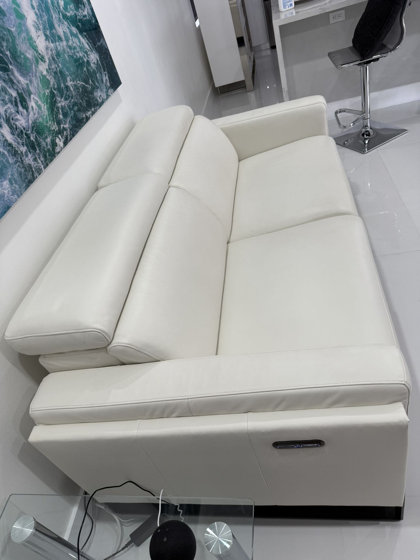 White Real Leather/Vinyl Power Reclining Sofa Loveseat Excellent Condition. Adjustable Headrest / Footrest. Dimensions: 83W x 33H x 43.5L. Was $2,400