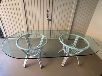 Glass top table 44x82 w/ bases.
