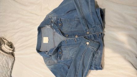 Women’s distressed denim jacket size large