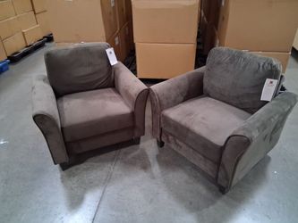 Two brown chairs