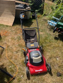 Lawn mower. Electric plug in