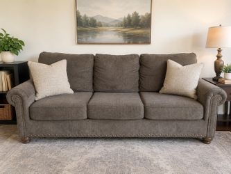 Comfortable 3 seat brown sofa