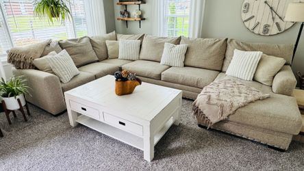 Sectional sleeper sofa with coffee table