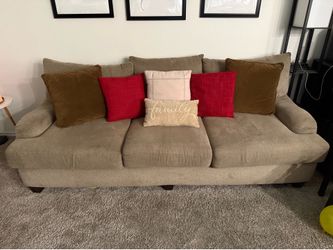 Couch w/pillows and oversized ottoman