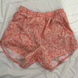 All in motion pink athletic shorts in the size large