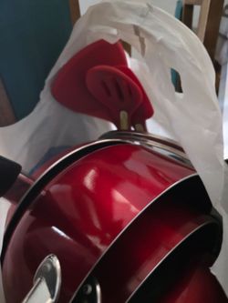 Red Nonstick Cookware Set with cooking spoons