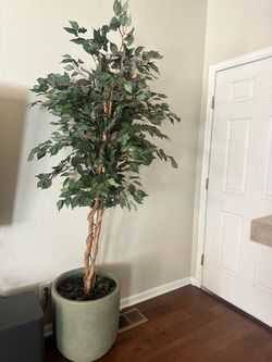 Faux tree nearly natural plus green pot