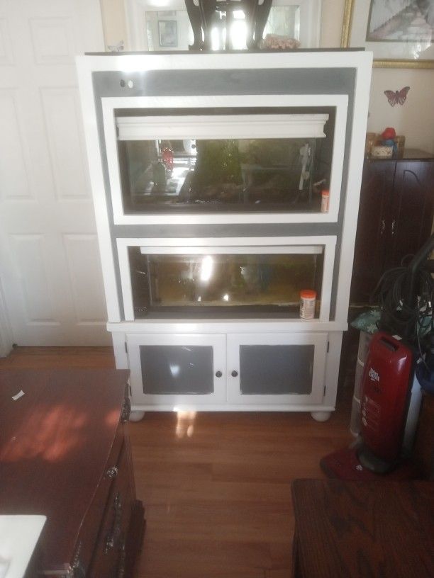 Homemade Fish Tank Stand Very Sturdy Holds 2. 40 Gallon Tank Tanks Come With It. And Everything You Need With The Tanks.