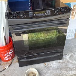 GE Profile Black Slide Glass Top Range 