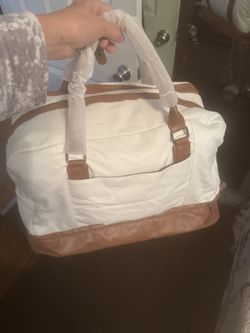 Brand New  3piece Travel Bag, 1 Bodycross Bag And Wristlet Bag 