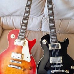 Epiphone quality Les Paul Guitars with a Cool Gibson Gig Bag $425 Each Or Trade; Great Shape & Performing Great Sounds with New Strings on. 