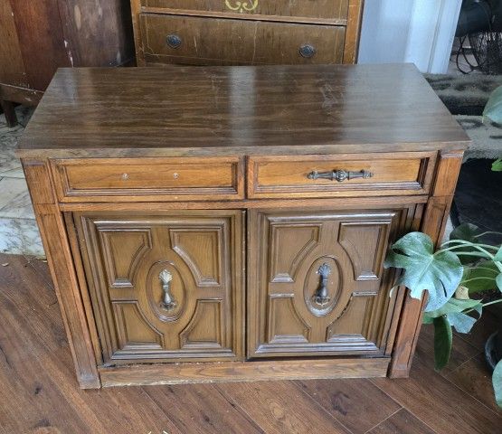 A Old Decorative End Table With A Hide Away Dinning Room Table, Seats 12