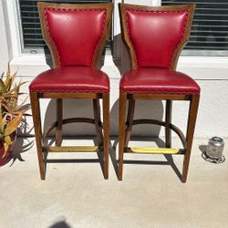 Two Leather Chairs
