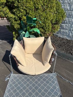 Like -New Brown Wicker Patio / Porch Hanging Swing Chair with Beige Cushions