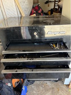 Snap On Tool Box with finger slide drawers, rolling wheels, and top and lower locks with keys
