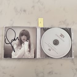 Taylor Swift The Tortured Poets Department CD With Hand Signed Photo Authentic