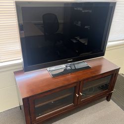 2 TV’s  Samsung and TV Table 
