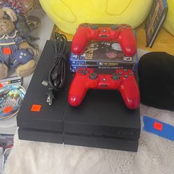 PlayStation 4 With Controllers And Games 