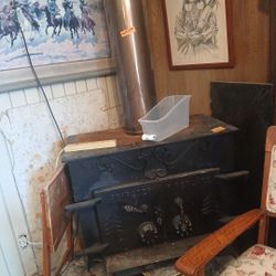 Antique Wood Burning  Earth Stove
